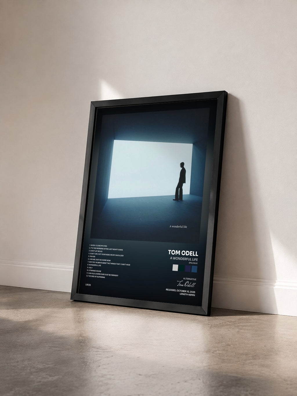#noir Tableau de l'album A Wonderful Life (Epilogue) de Tom Odell vu de trois quarts, cadre noir