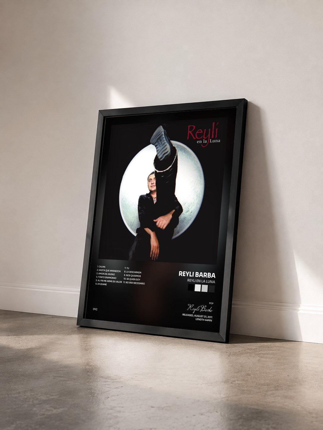 #noir Tableau de l'album Reyli En La Luna de Reyli Barba vu de trois quarts, cadre noir