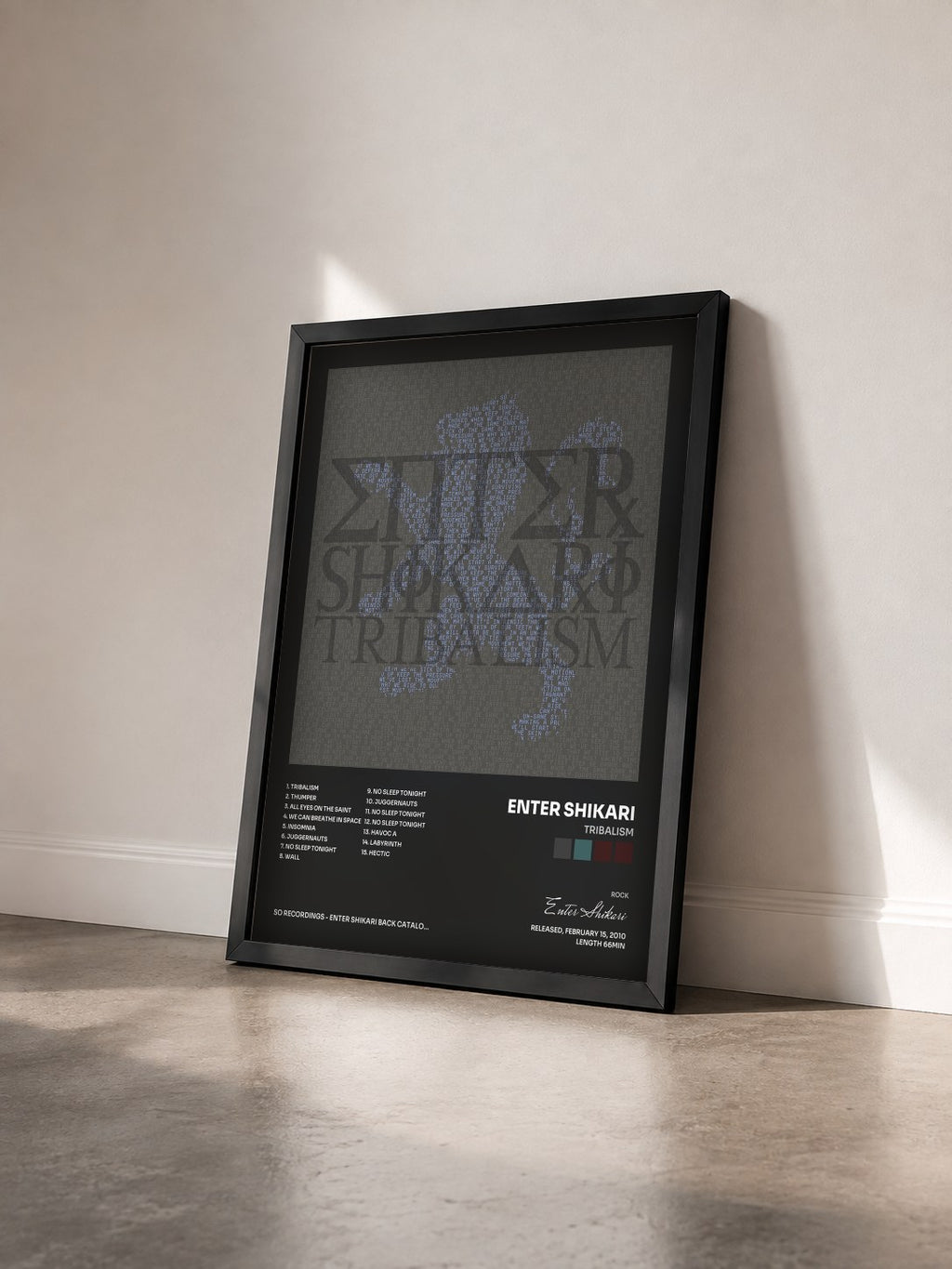 #noir Tableau de l'album Tribalism de Enter Shikari vu de trois quarts, cadre noir