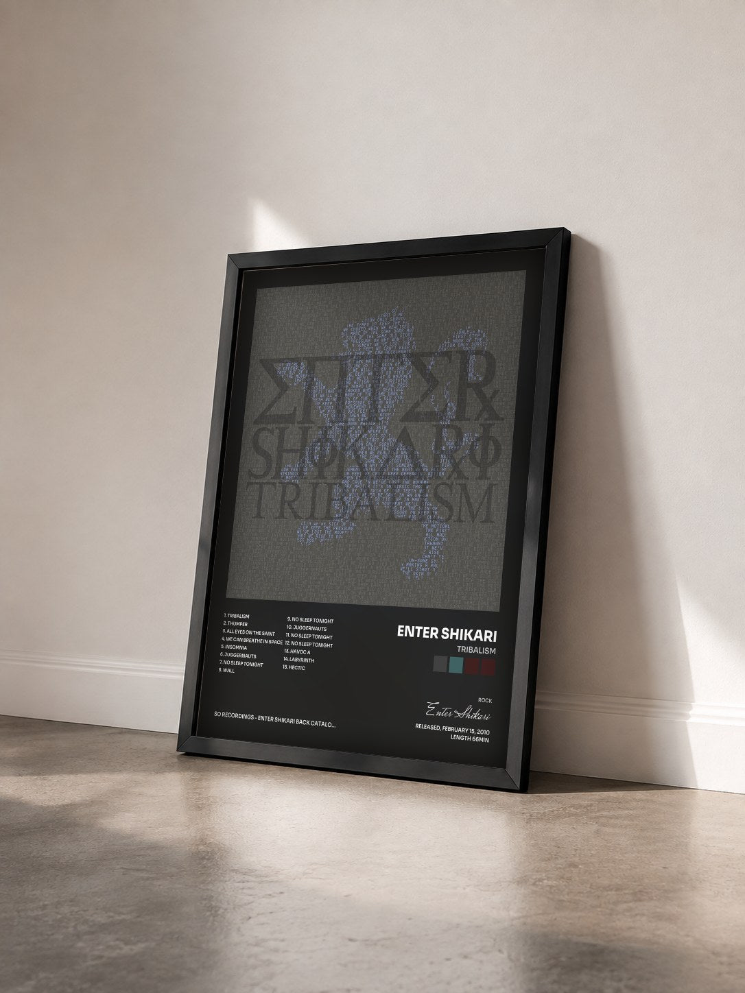 #noir Tableau de l'album Tribalism de Enter Shikari vu de trois quarts, cadre noir