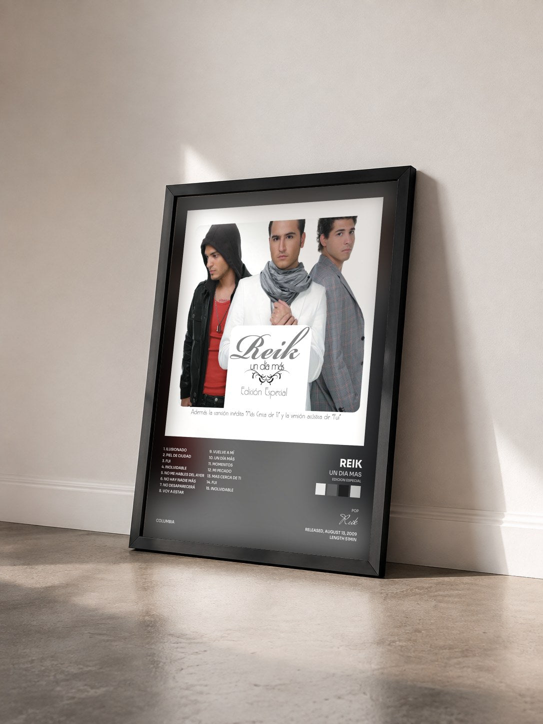#noir Tableau de l'album Un Dia Mas (Edicion Especial) de Reik vu de trois quarts, cadre noir