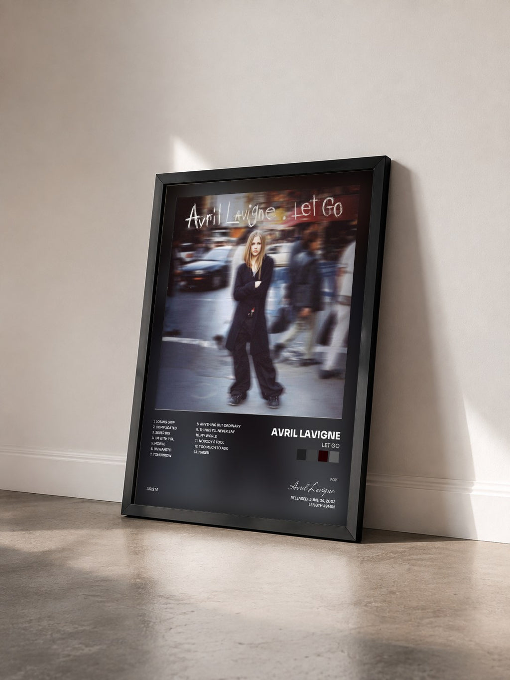 #noir Tableau de l'album Let Go de Avril Lavigne vu de trois quarts, cadre noir