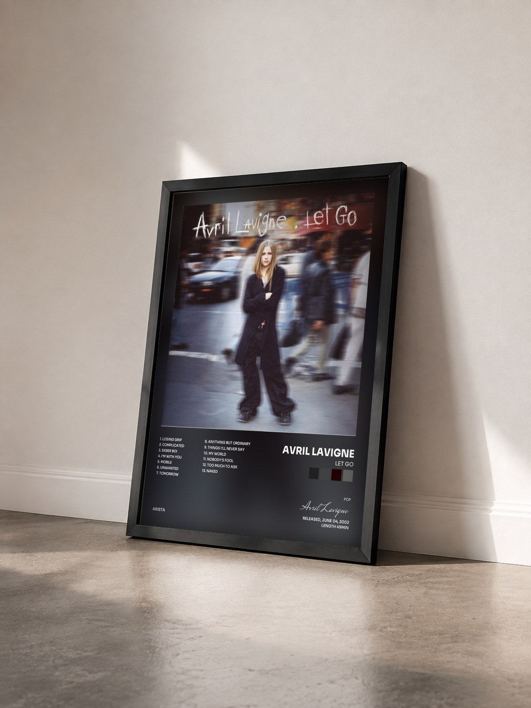 #noir Tableau de l'album Let Go de Avril Lavigne vu de trois quarts, cadre noir