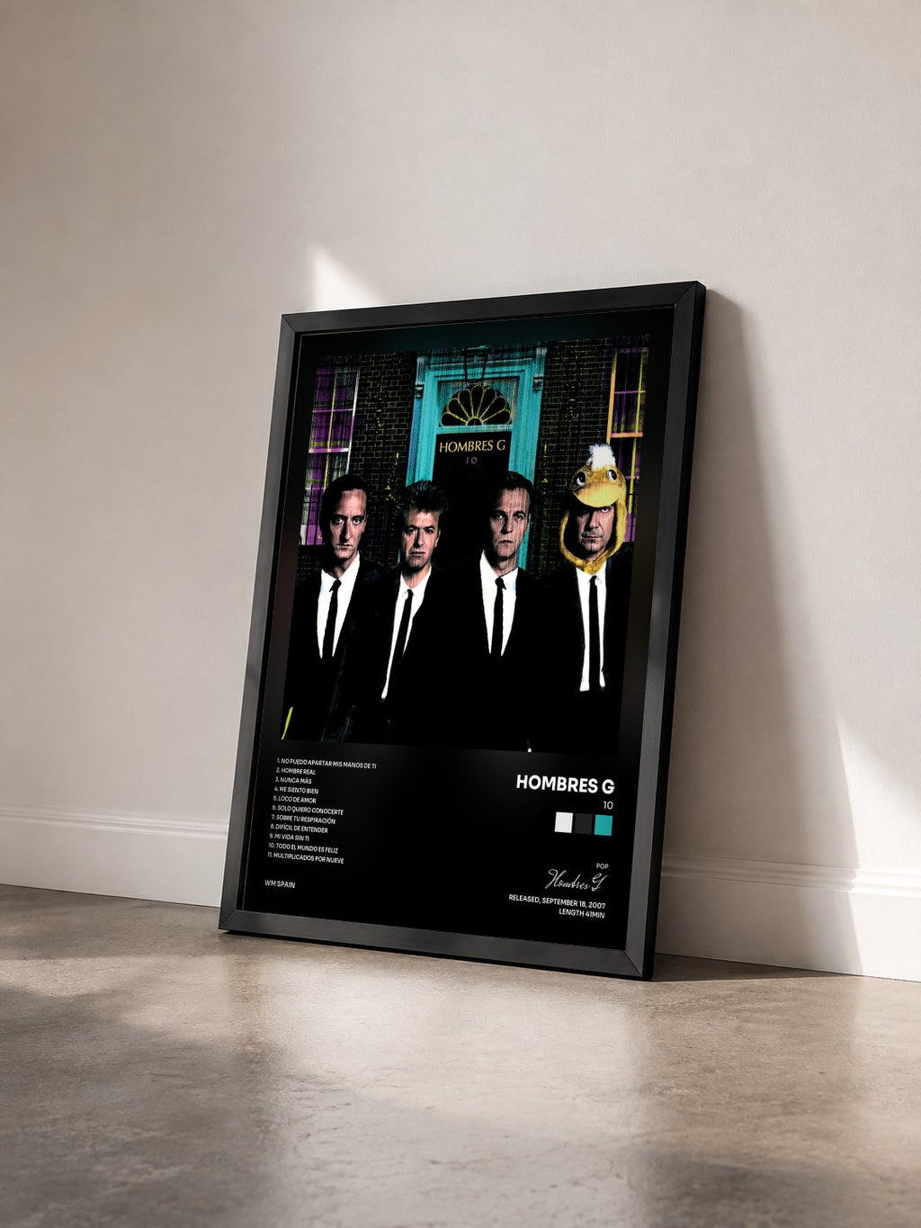 #noir Tableau de l'album 10 de Hombres G vu de trois quarts, cadre noir