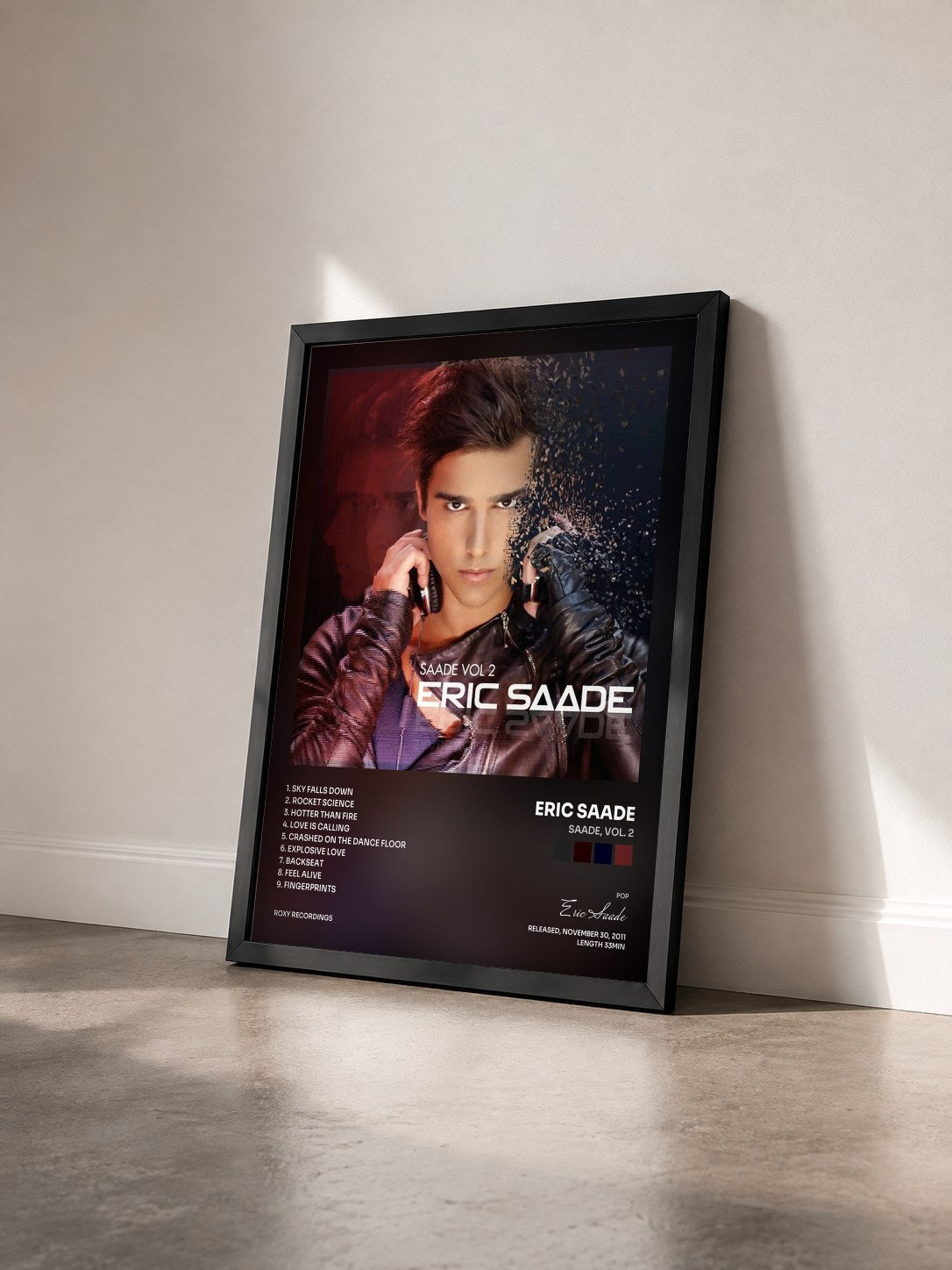 #noir Tableau de l'album Saade, Vol. 2 de Eric Saade vu de trois quarts, cadre noir