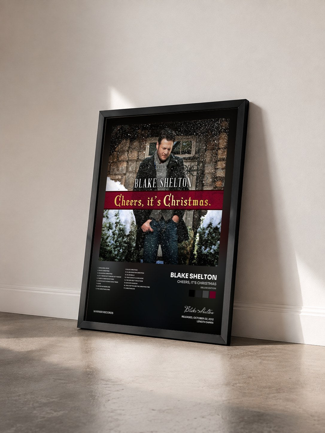 #noir Tableau de l'album Cheers, It's Christmas (Deluxe Edition) de Blake Shelton vu de trois quarts, cadre noir