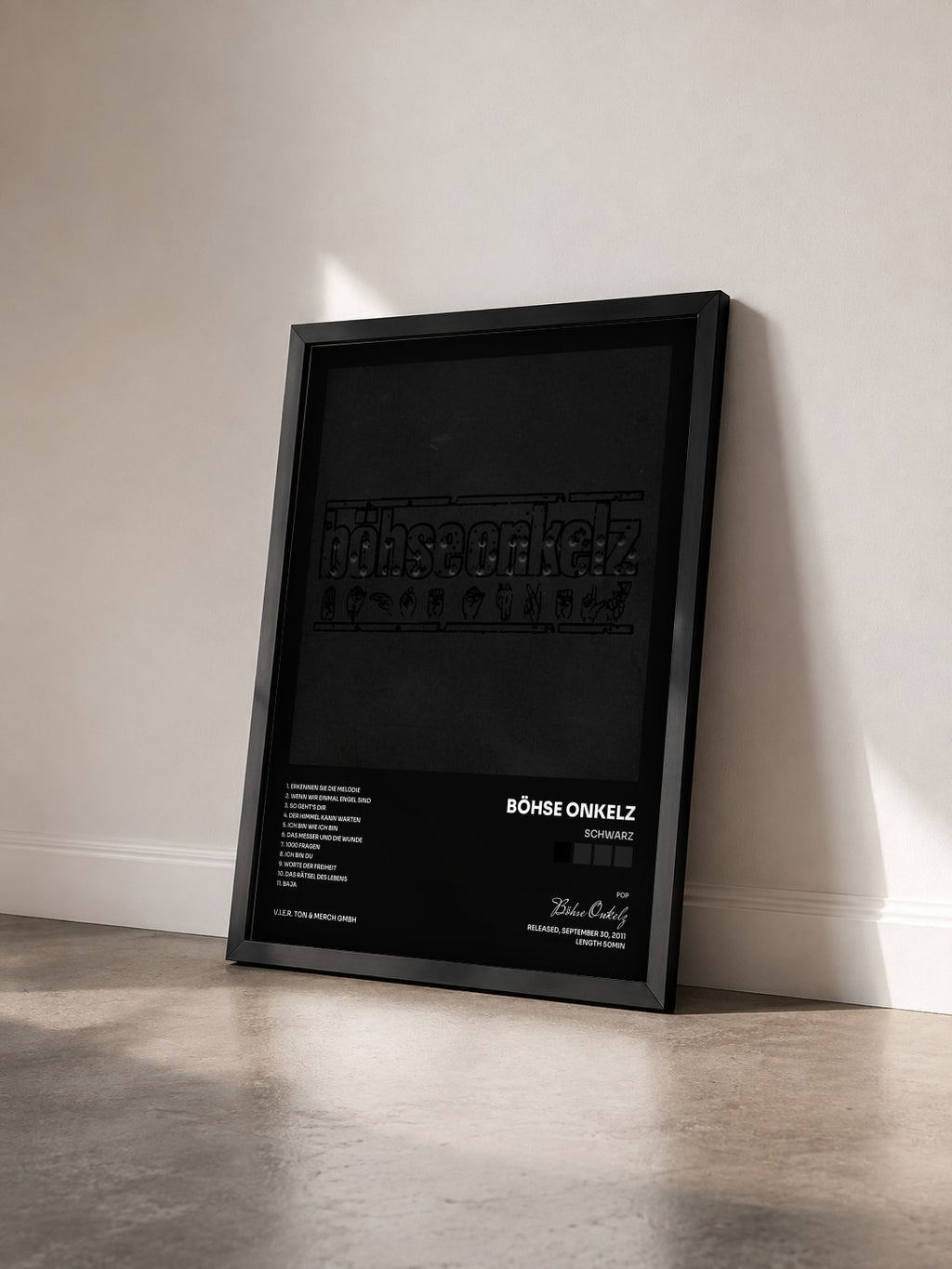 #noir Tableau de l'album Schwarz de Böhse Onkelz vu de trois quarts, cadre noir