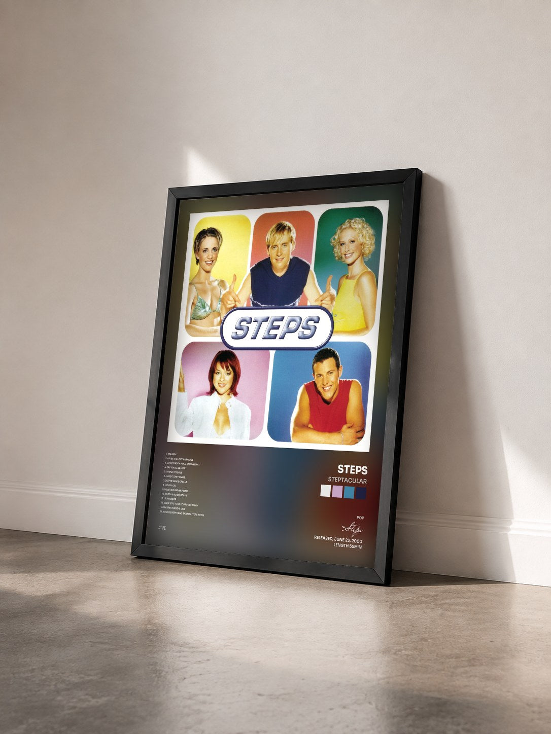 #noir Tableau de l'album Steptacular de Steps vu de trois quarts, cadre noir