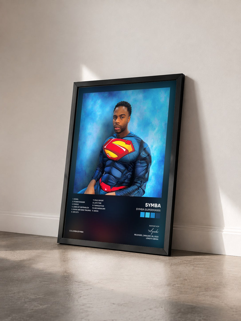 #noir Tableau de l'album Symba Supermann de Symba vu de trois quarts, cadre noir