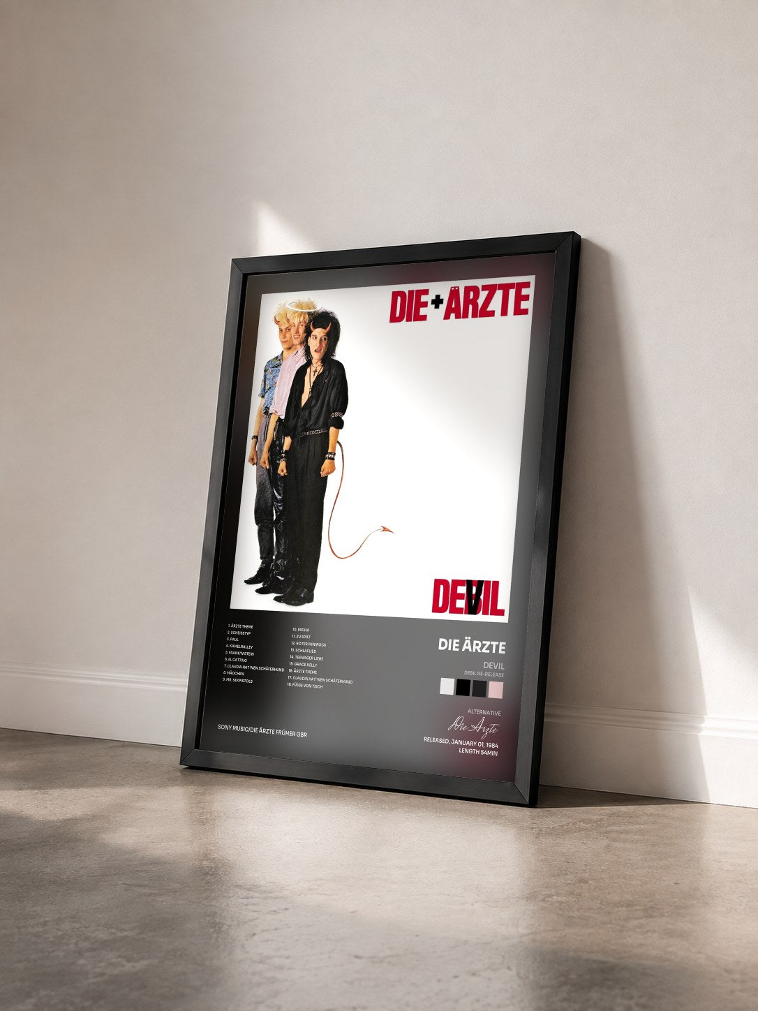 #noir Tableau de l'album Devil (Debil Re-Release) de Die Ärzte vu de trois quarts, cadre noir