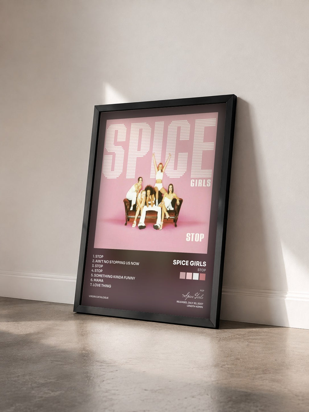 #noir Tableau de l'album Stop de Spice Girls vu de trois quarts, cadre noir
