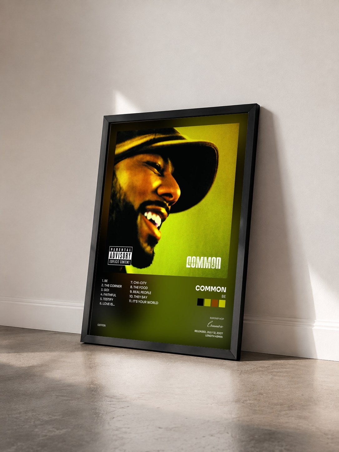 #noir Tableau de l'album Be de Common vu de trois quarts, cadre noir