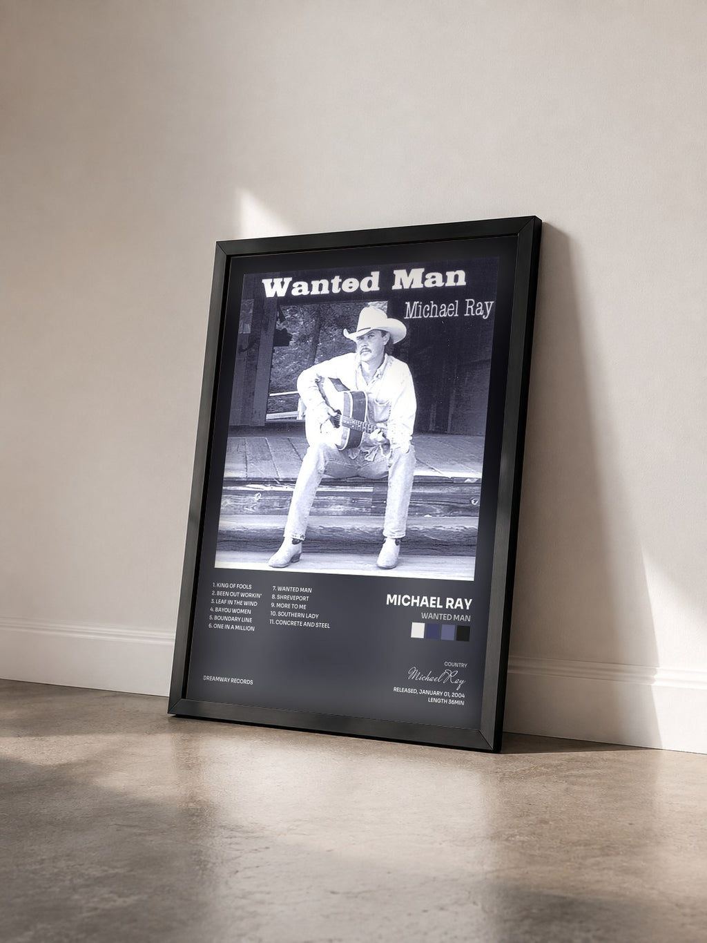 #noir Tableau de l'album Wanted Man de Michael Ray vu de trois quarts, cadre noir