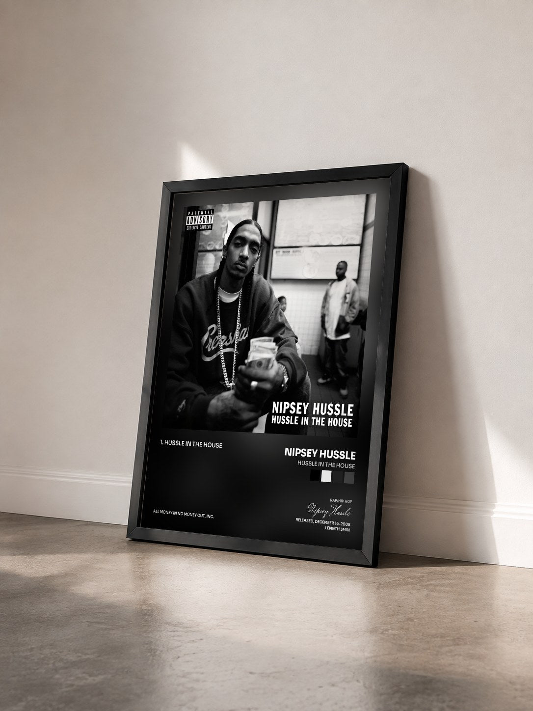 #noir Tableau de l'album Hussle in the House de Nipsey Hussle vu de trois quarts, cadre noir