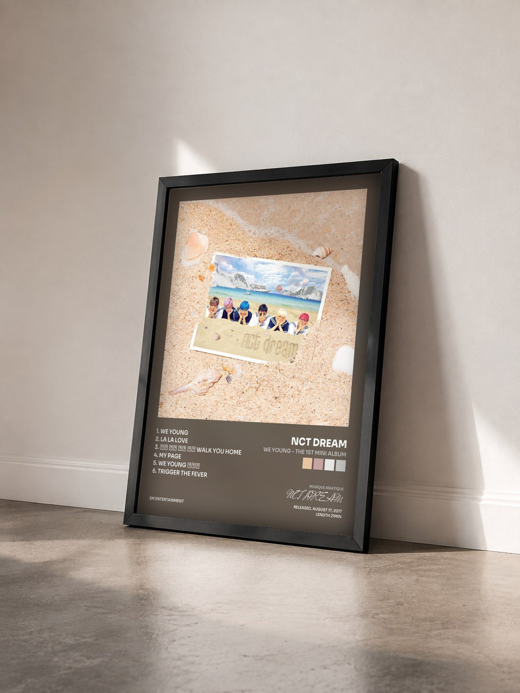 #noir Tableau de l'album We Young - The 1st Mini Album de NCT DREAM vu de trois quarts, cadre noir