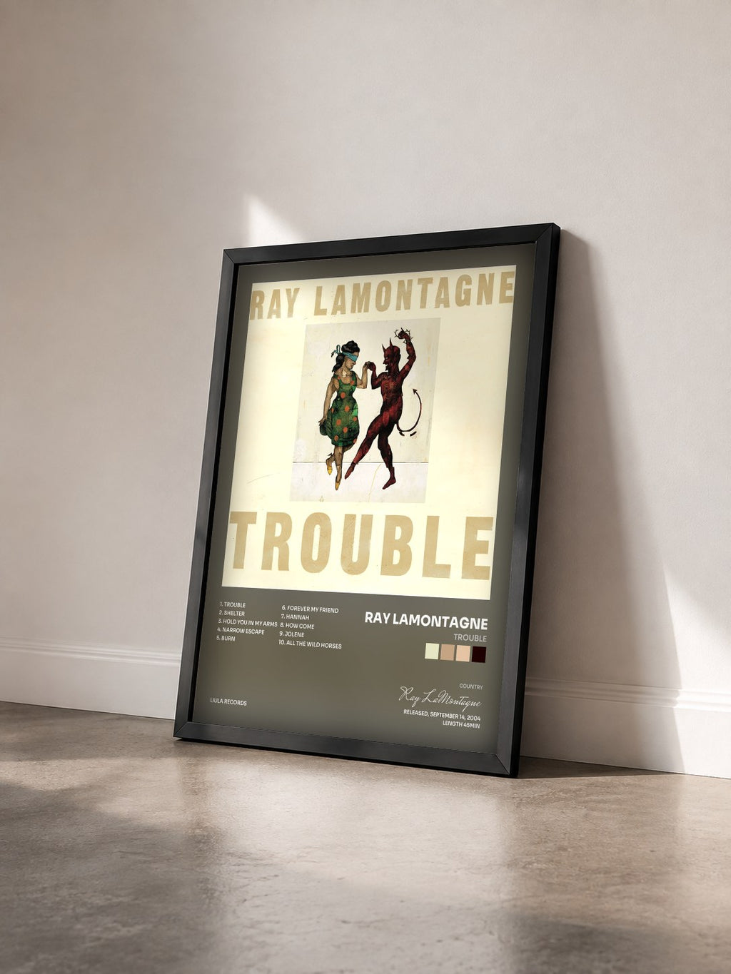 #noir Tableau de l'album Trouble de Ray LaMontagne vu de trois quarts, cadre noir