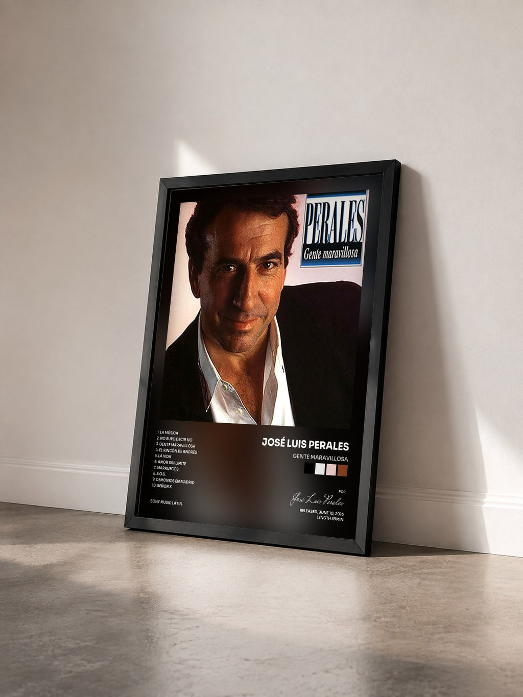 #noir Tableau de l'album Gente Maravillosa de José Luis Perales vu de trois quarts, cadre noir