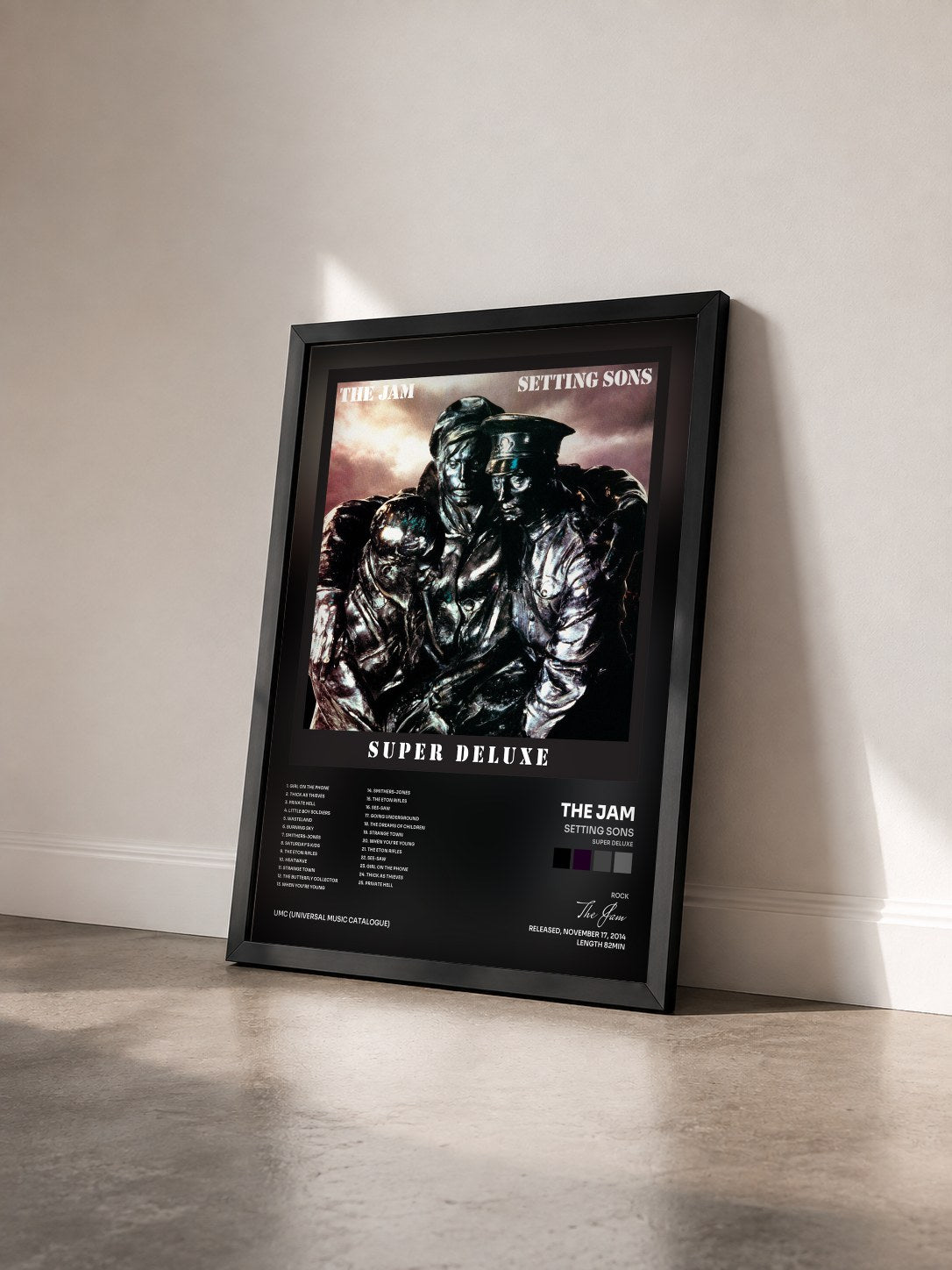 #noir Tableau de l'album Setting Sons (Super Deluxe) de The Jam vu de trois quarts, cadre noir
