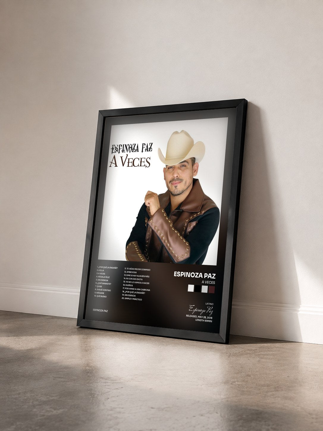 #noir Tableau de l'album A Veces de Espinoza Paz vu de trois quarts, cadre noir