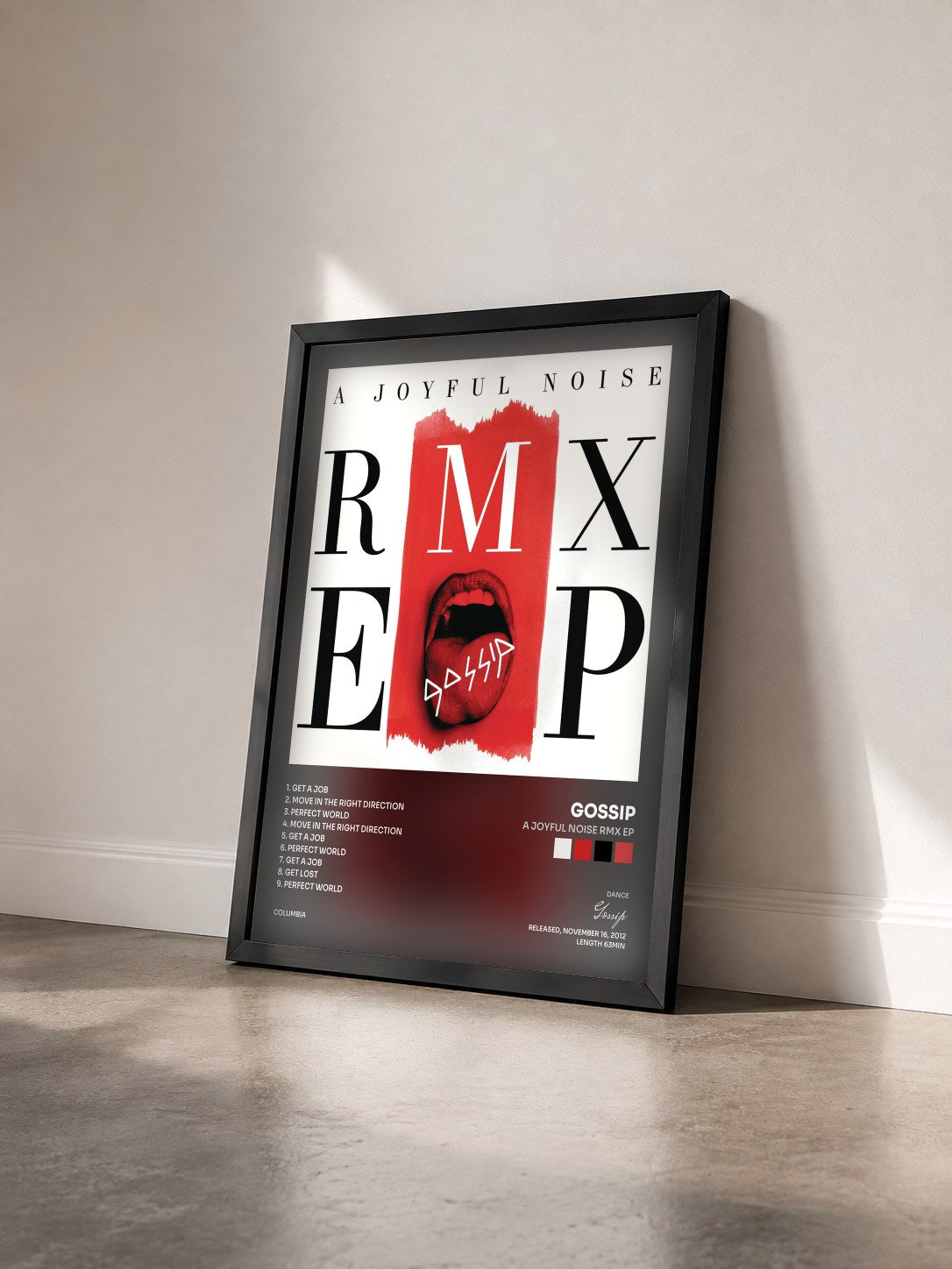 #noir Tableau de l'album A Joyful Noise RMX EP de Gossip vu de trois quarts, cadre noir