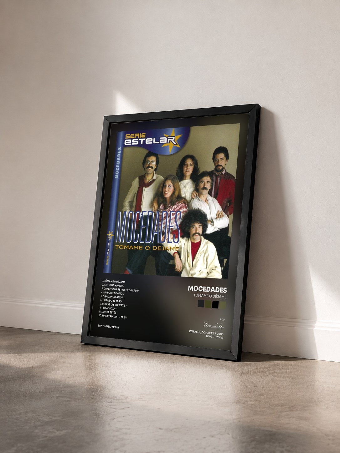 #noir Tableau de l'album Tómame O Déjame de Mocedades vu de trois quarts, cadre noir