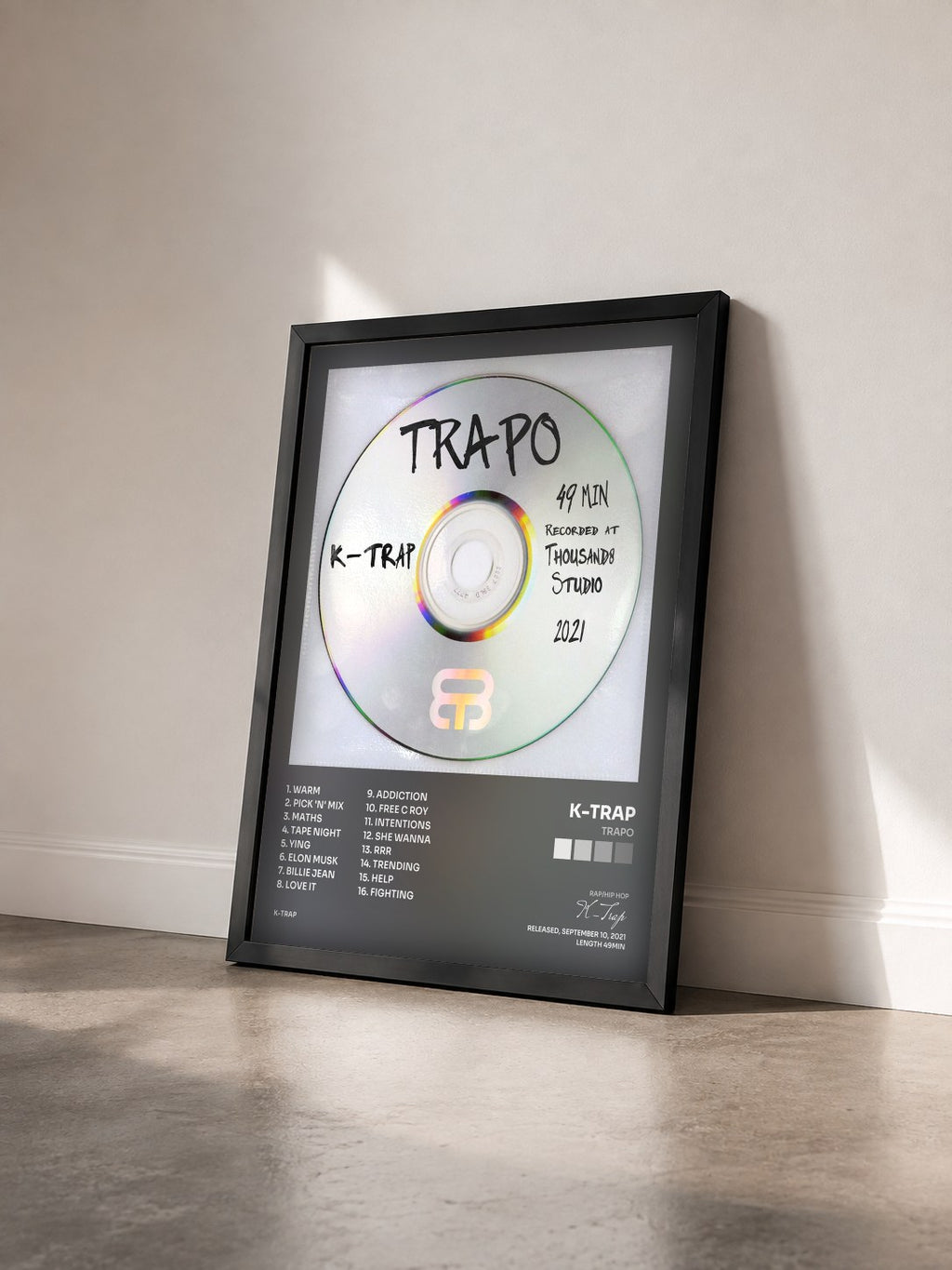 #noir Tableau de l'album Trapo de K-Trap vu de trois quarts, cadre noir