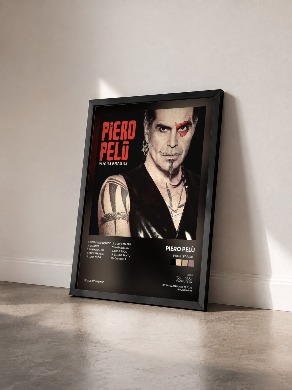 #noir Tableau de l'album Pugili fragili de Piero Pelù vu de trois quarts, cadre noir