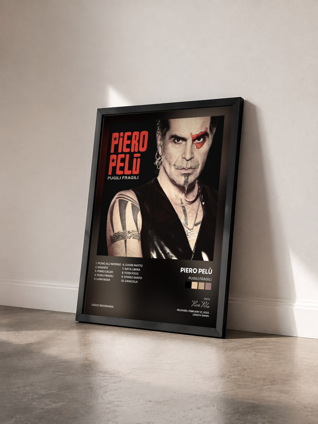 #noir Tableau de l'album Pugili fragili de Piero Pelù vu de trois quarts, cadre noir