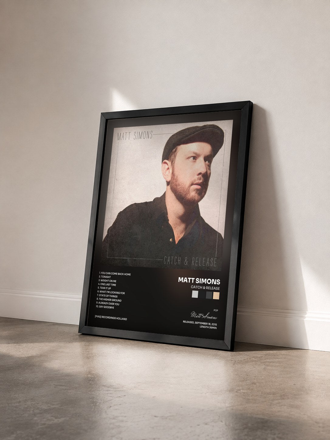 #noir Tableau de l'album Catch & Release de Matt Simons vu de trois quarts, cadre noir