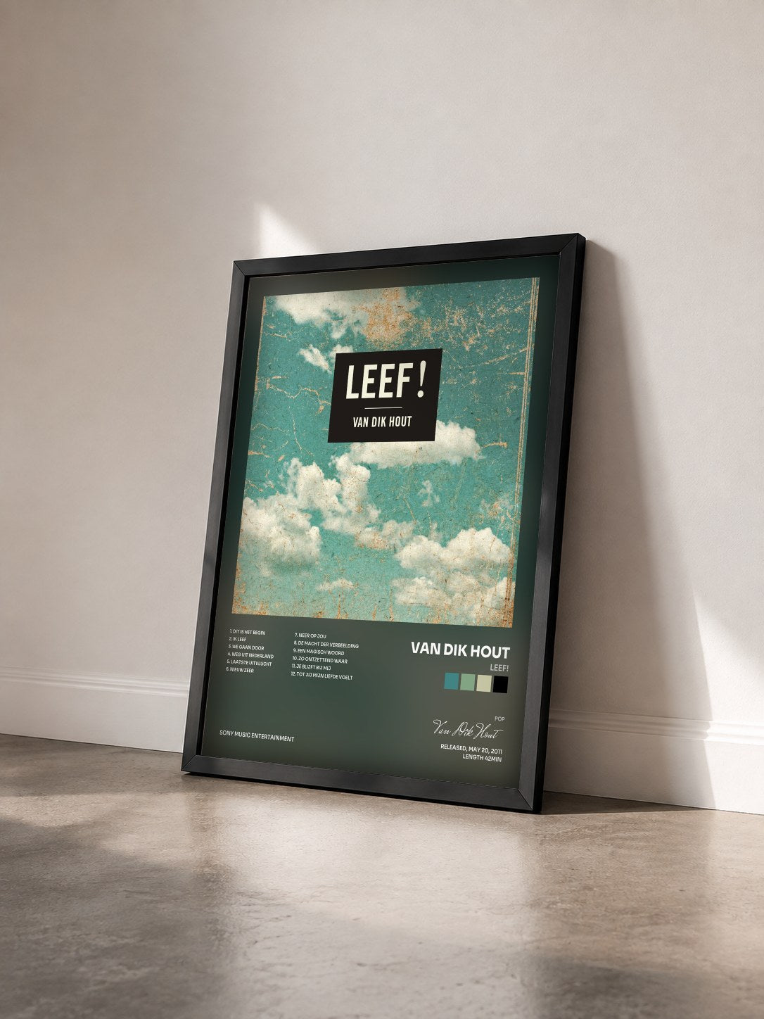#noir Tableau de l'album Leef! de Van Dik Hout vu de trois quarts, cadre noir