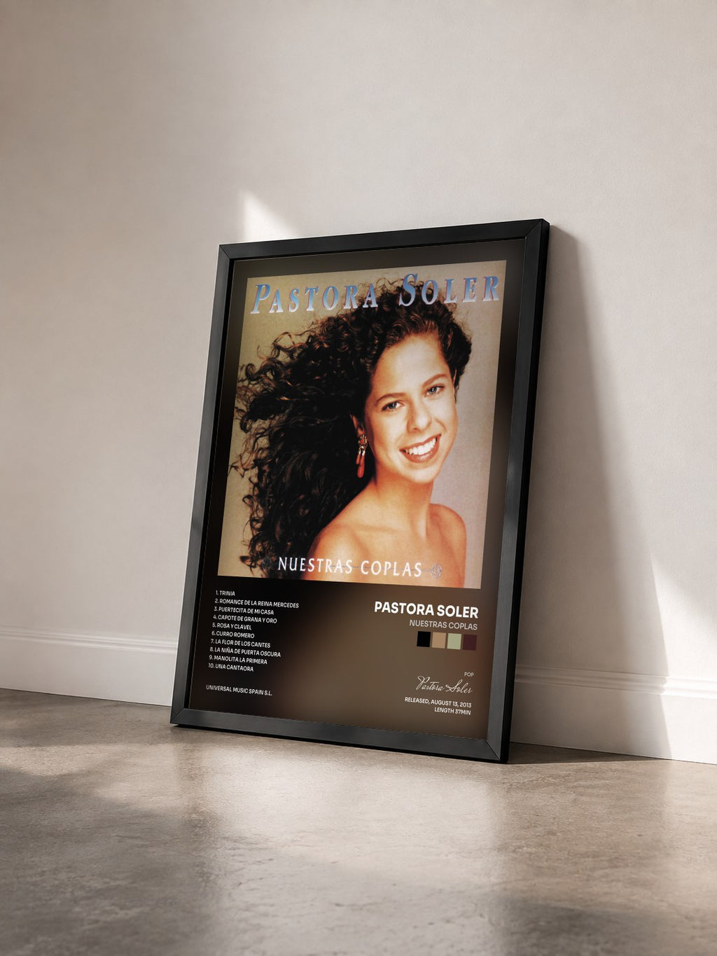 #noir Tableau de l'album Nuestras Coplas de Pastora Soler vu de trois quarts, cadre noir