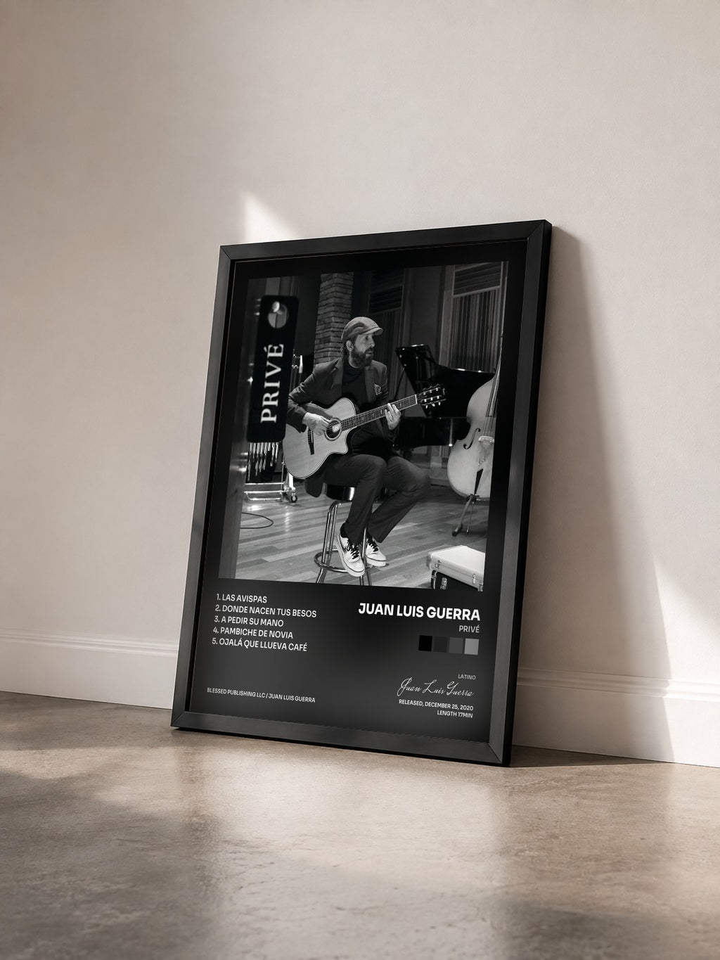 #noir Tableau de l'album Privé de Juan Luis Guerra vu de trois quarts, cadre noir