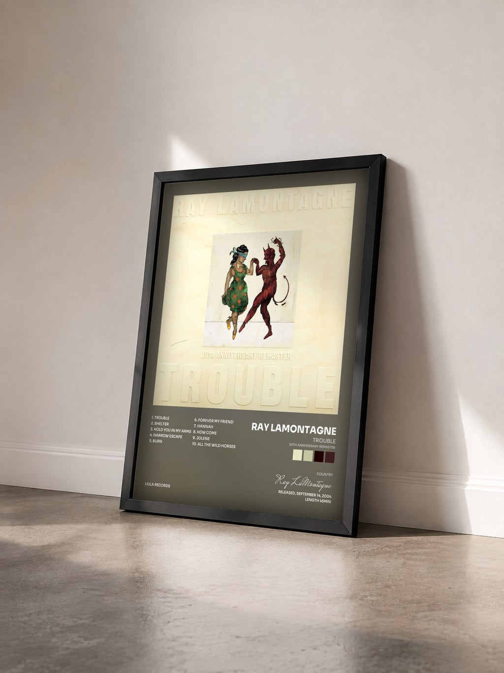#noir Tableau de l'album Trouble (20th Anniversary Remaster) de Ray LaMontagne vu de trois quarts, cadre noir
