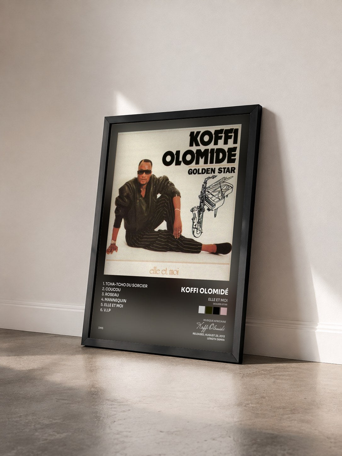 #noir Tableau de l'album Elle et moi (Golden Star) de Koffi Olomidé vu de trois quarts, cadre noir