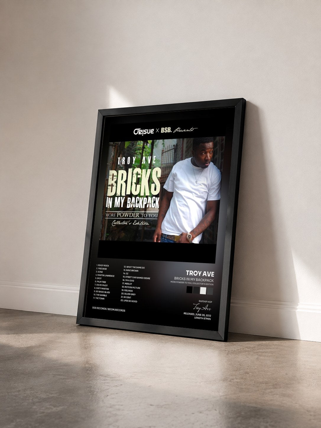 #noir Tableau de l'album Bricks In My Backpack (More Powder To You, Collector's Edition) de Troy Ave vu de trois quarts, cadre noir