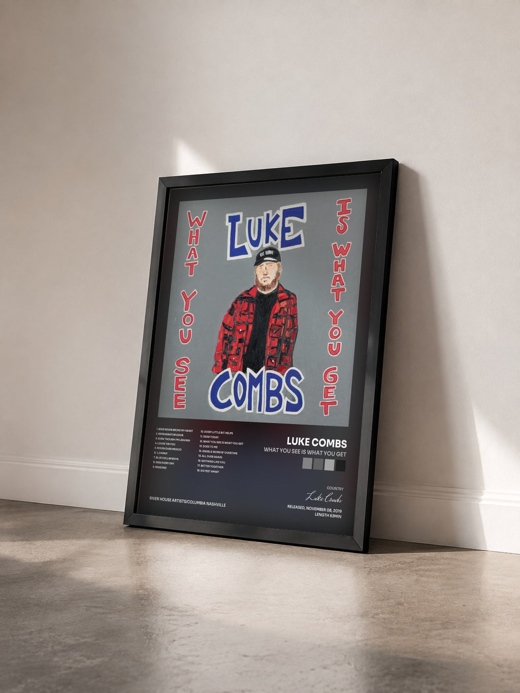 #noir Tableau de l'album What You See Is What You Get de Luke Combs vu de trois quarts, cadre noir