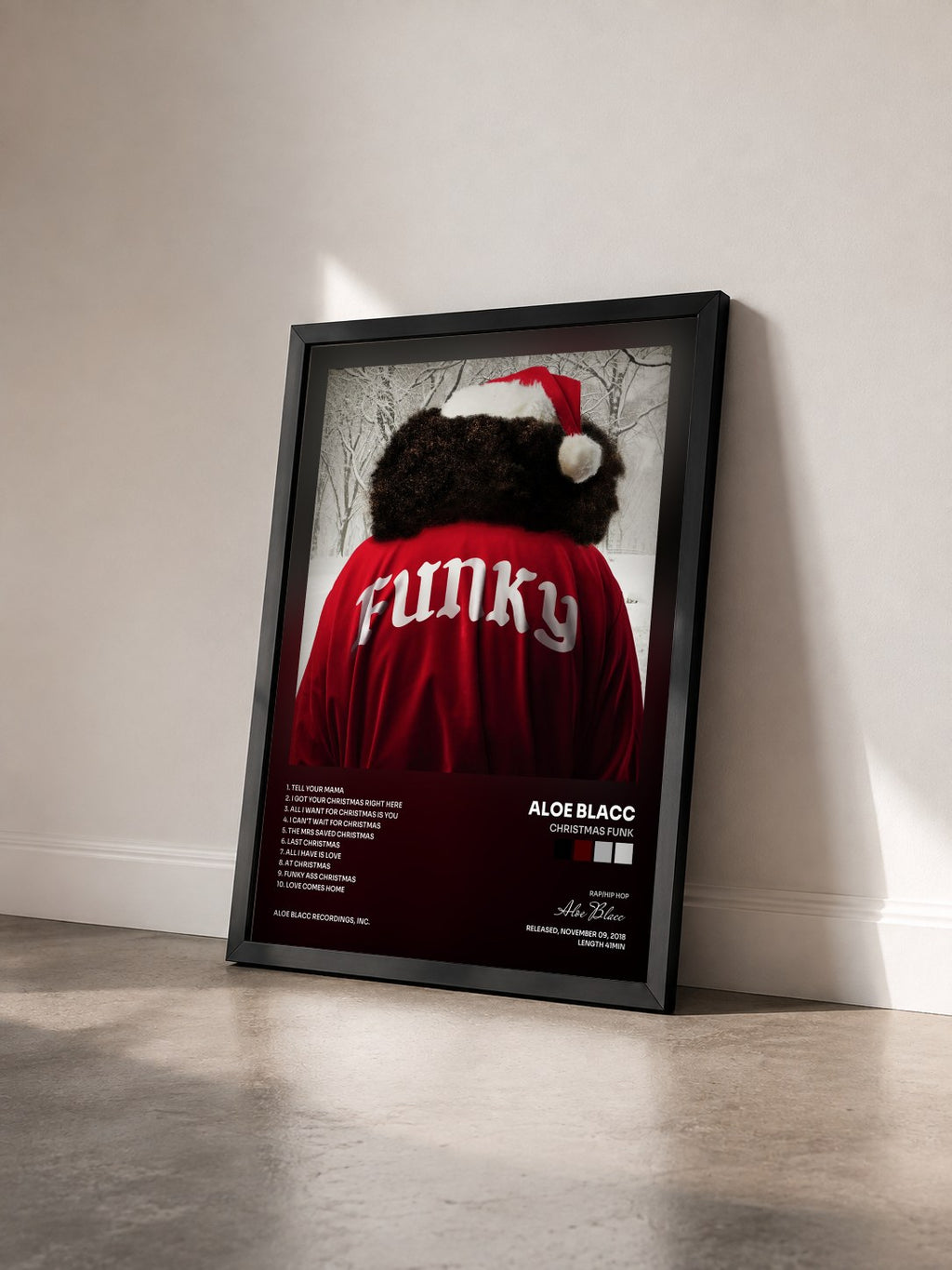 #noir Tableau de l'album Christmas Funk de Aloe Blacc vu de trois quarts, cadre noir
