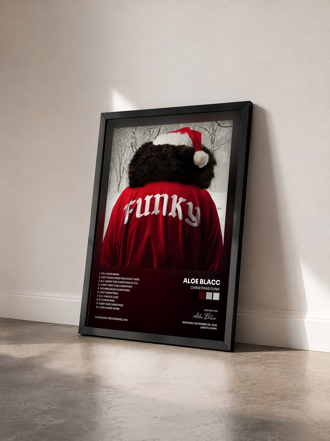 #noir Tableau de l'album Christmas Funk de Aloe Blacc vu de trois quarts, cadre noir