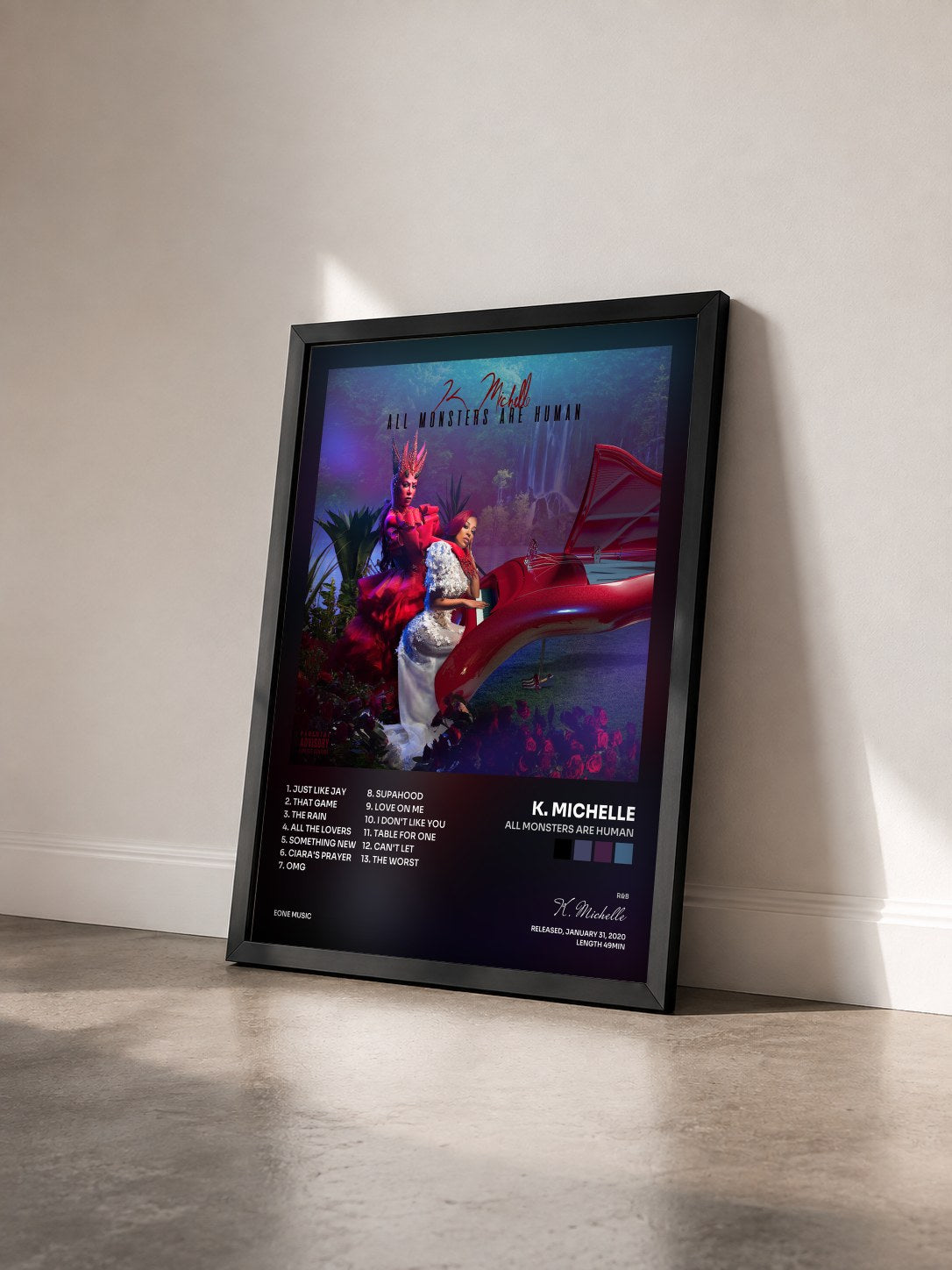 #noir Tableau de l'album All Monsters Are Human de K. Michelle vu de trois quarts, cadre noir