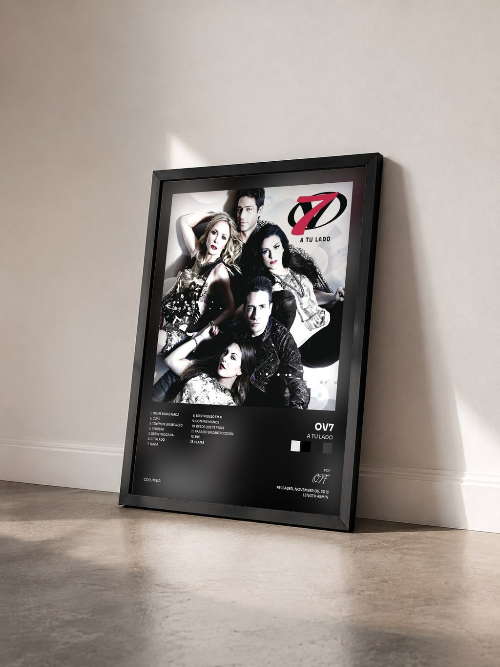 #noir Tableau de l'album A Tu Lado de OV7 vu de trois quarts, cadre noir