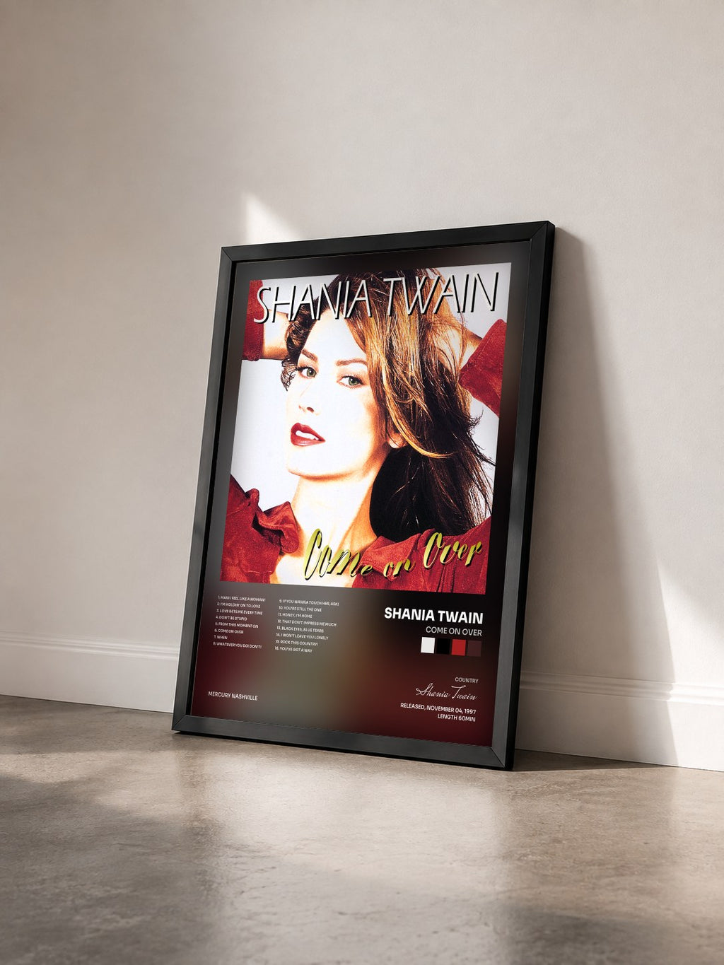 #noir Tableau de l'album Come On Over de Shania Twain vu de trois quarts, cadre noir