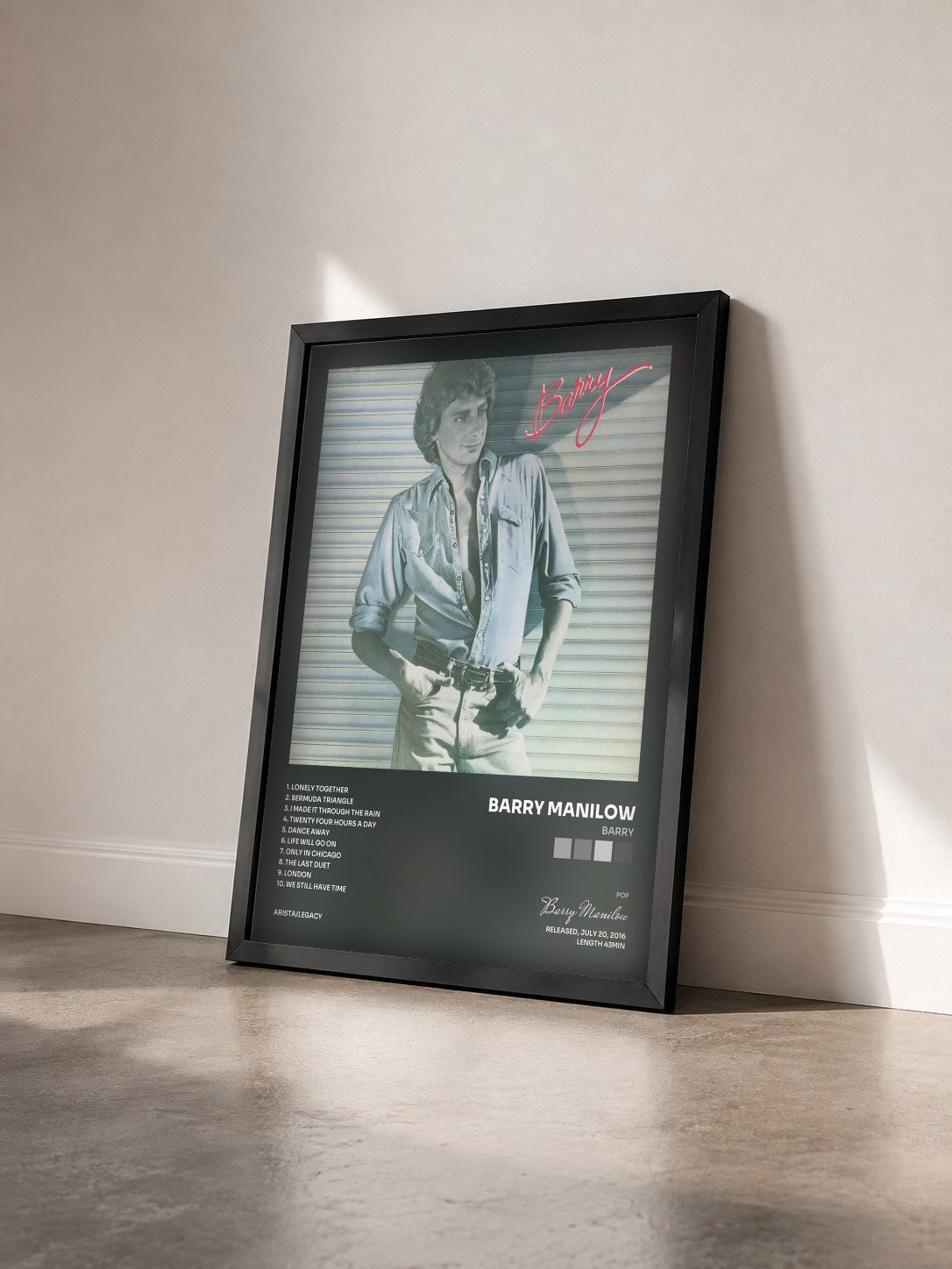 #noir Tableau de l'album Barry de Barry Manilow vu de trois quarts, cadre noir