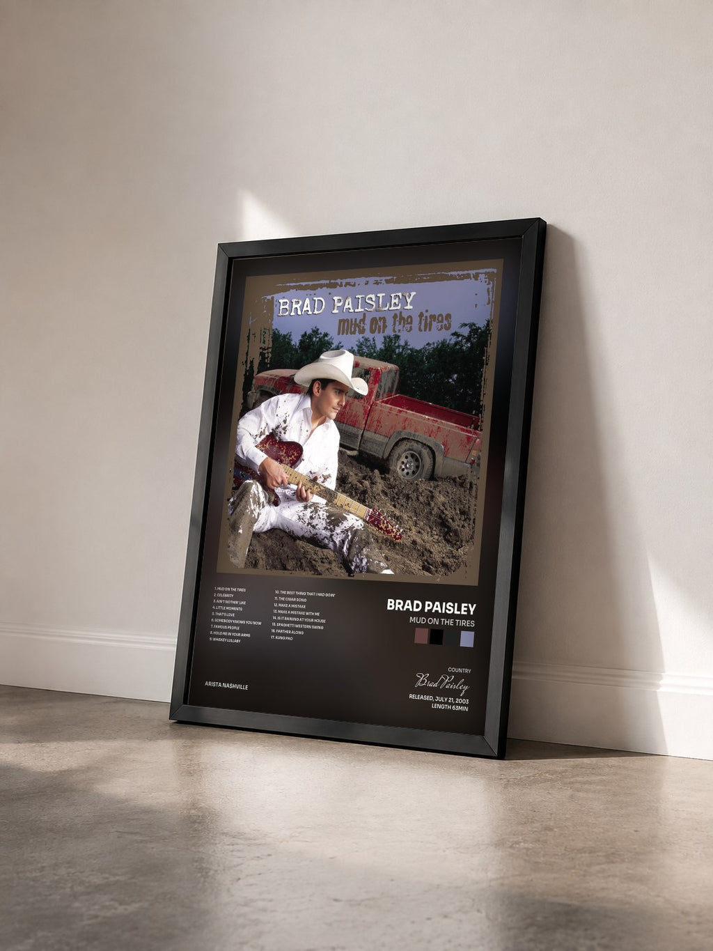 #noir Tableau de l'album Mud On The Tires de Brad Paisley vu de trois quarts, cadre noir