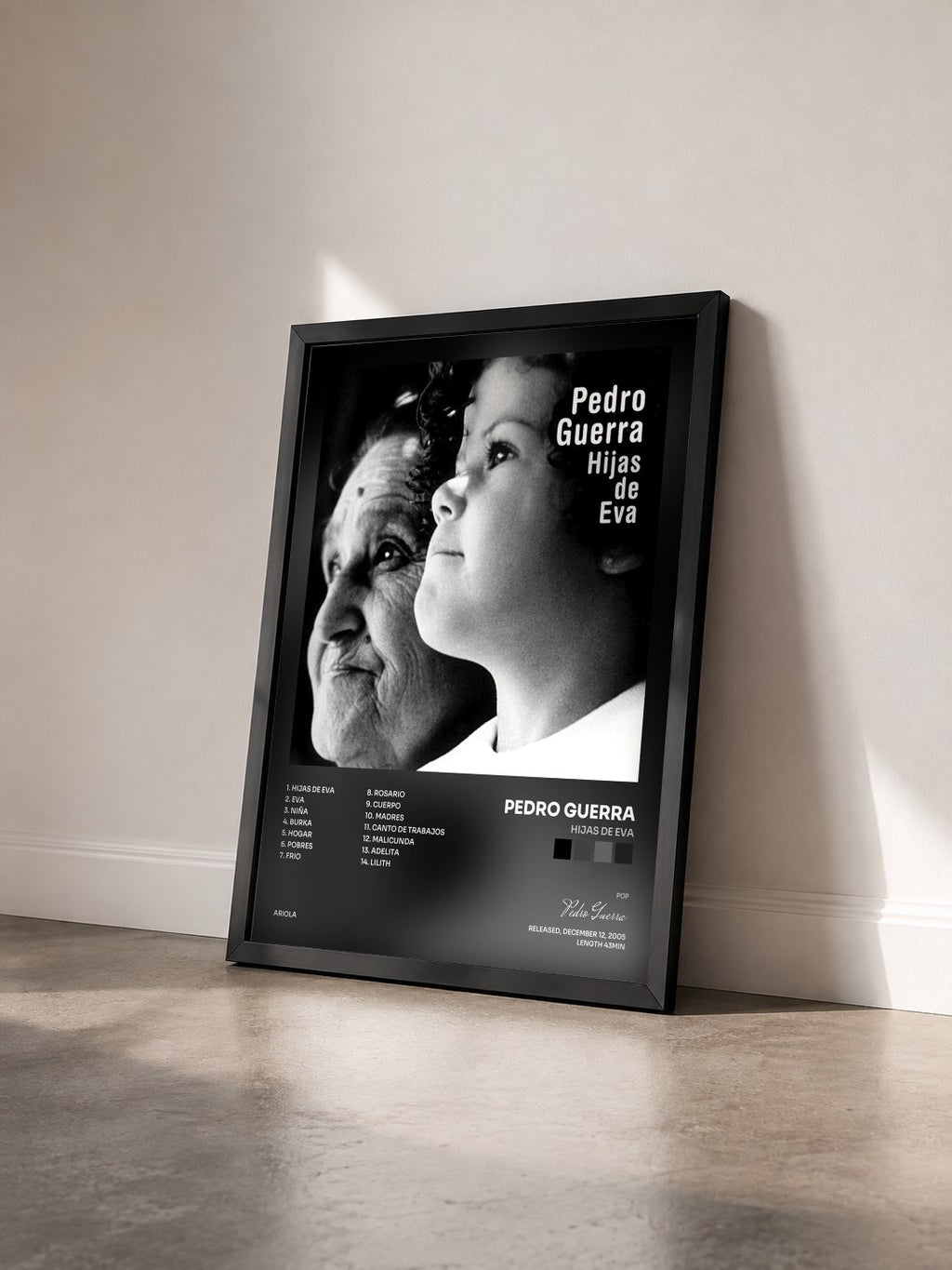 #noir Tableau de l'album Hijas De Eva de Pedro Guerra vu de trois quarts, cadre noir