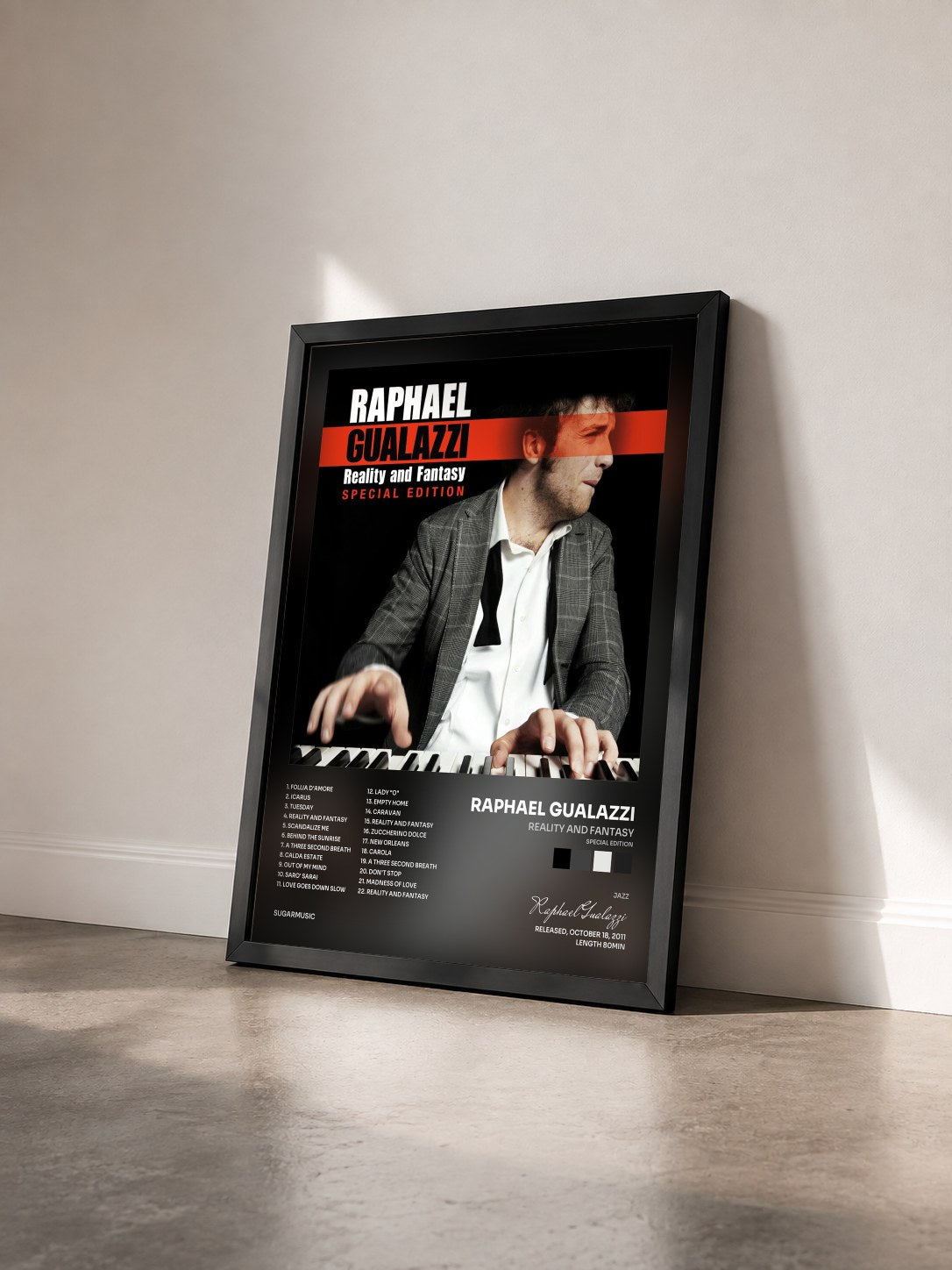 #noir Tableau de l'album Reality And Fantasy (Special Edition) de Raphael Gualazzi vu de trois quarts, cadre noir
