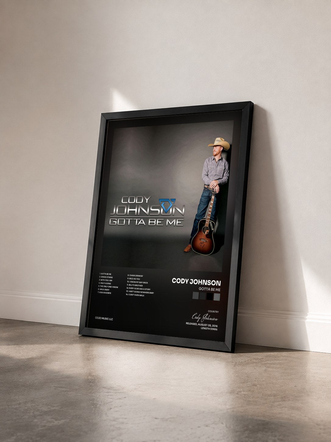 #noir Tableau de l'album Gotta Be Me de Cody Johnson vu de trois quarts, cadre noir