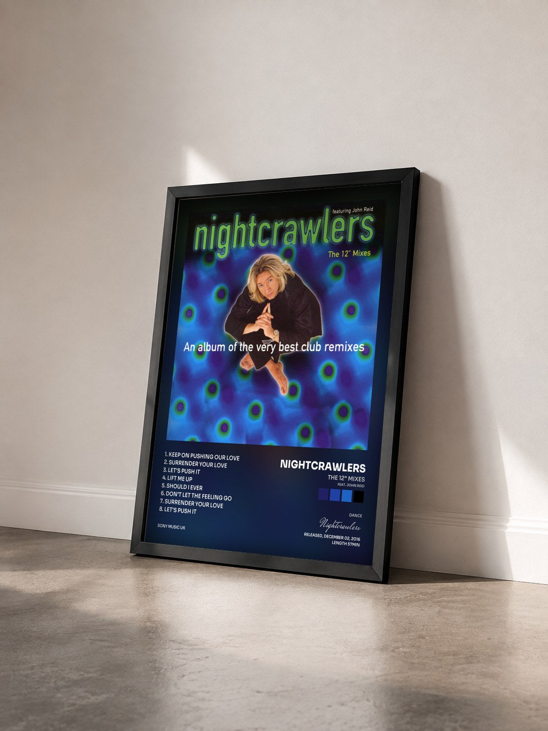 #noir Tableau de l'album The 12" Mixes (feat. John Reid) de Nightcrawlers vu de trois quarts, cadre noir