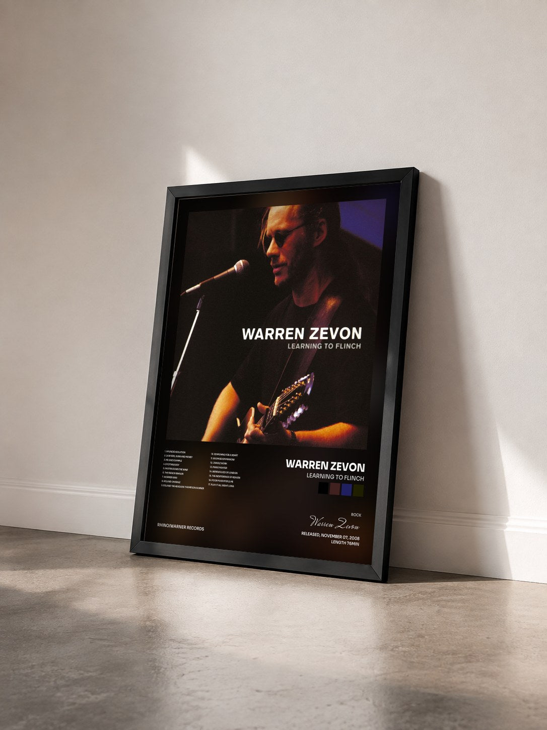 #noir Tableau de l'album Learning to Flinch de Warren Zevon vu de trois quarts, cadre noir
