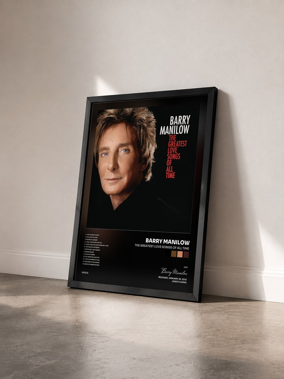 #noir Tableau de l'album The Greatest Love Songs Of All Time de Barry Manilow vu de trois quarts, cadre noir
