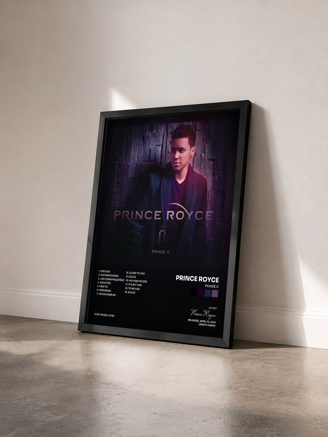 #noir Tableau de l'album Phase II de Prince Royce vu de trois quarts, cadre noir